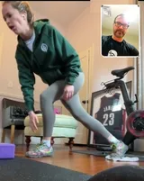 A client training on Zoom from her living room with Jamie Atlas coaching on the laptop