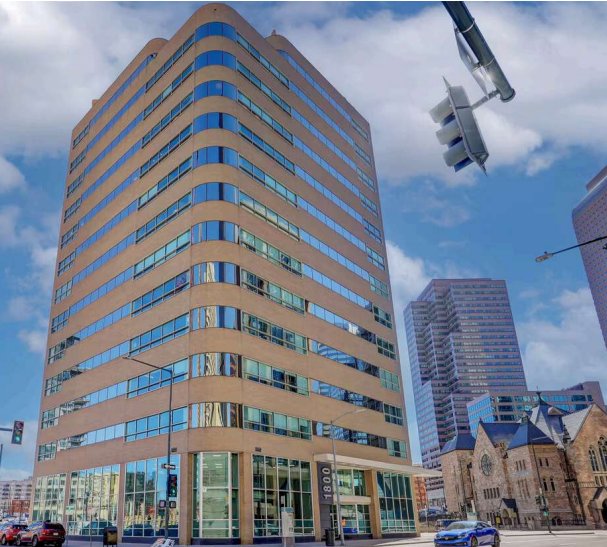 The office tower at 1800 Glenarm Place, Denver — the studio is on the basement level